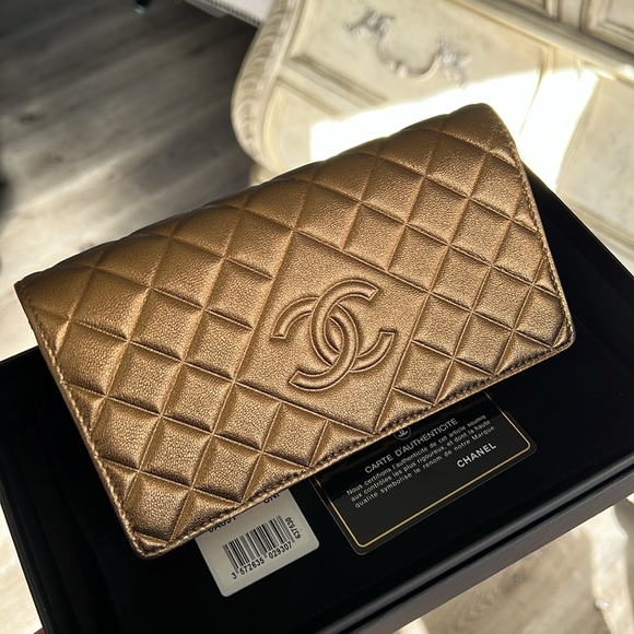 CHANEL Handbags - Chanel Dark Gold Quilted Flap Wallet